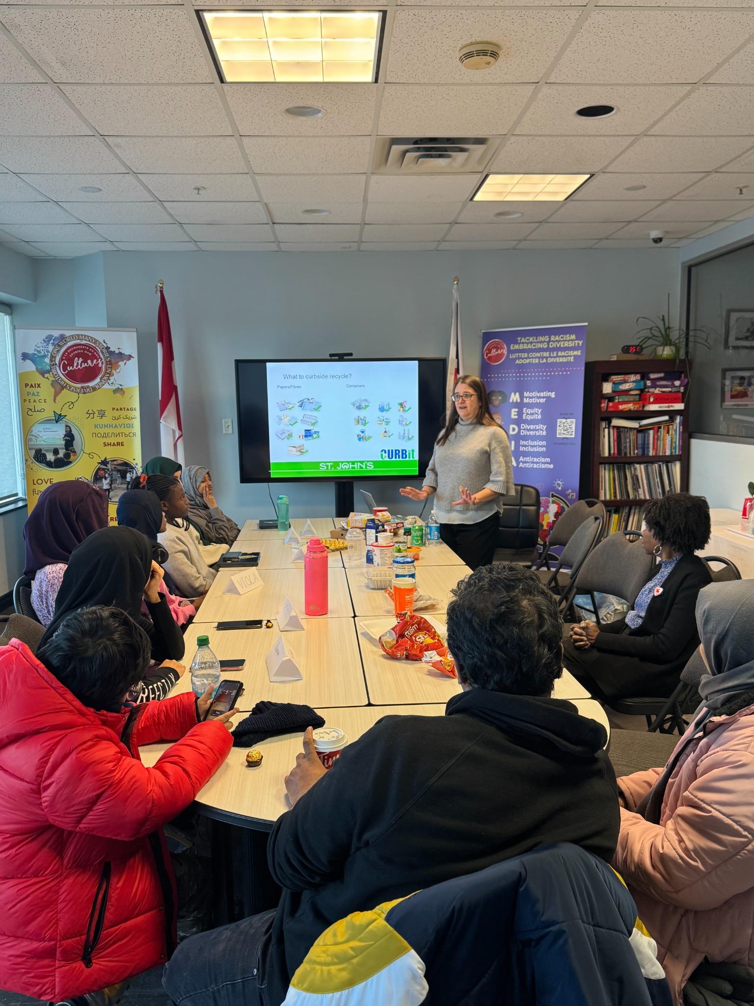 Slide about curbside recycling rules presented to students