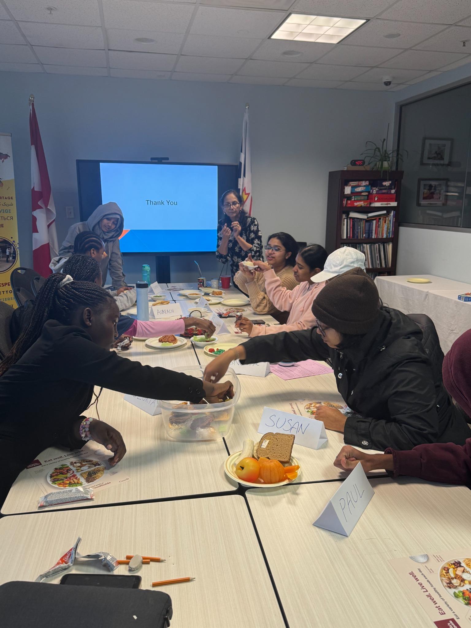Youth participating in a healthy food activity