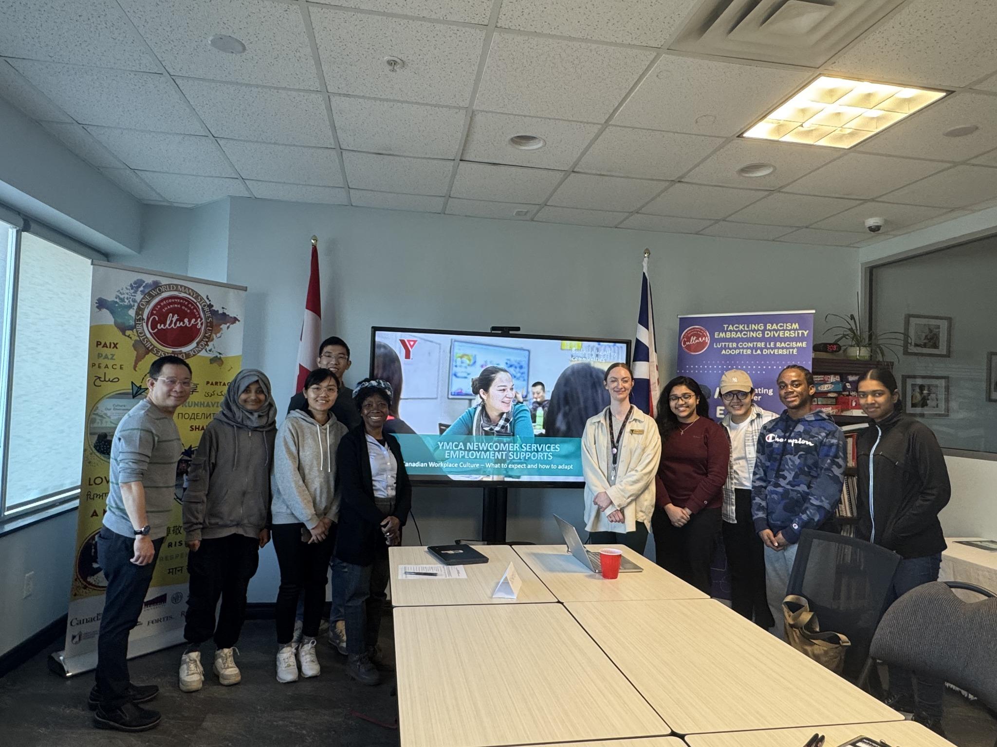 Group photo with facilitators and participants after workplace culture session